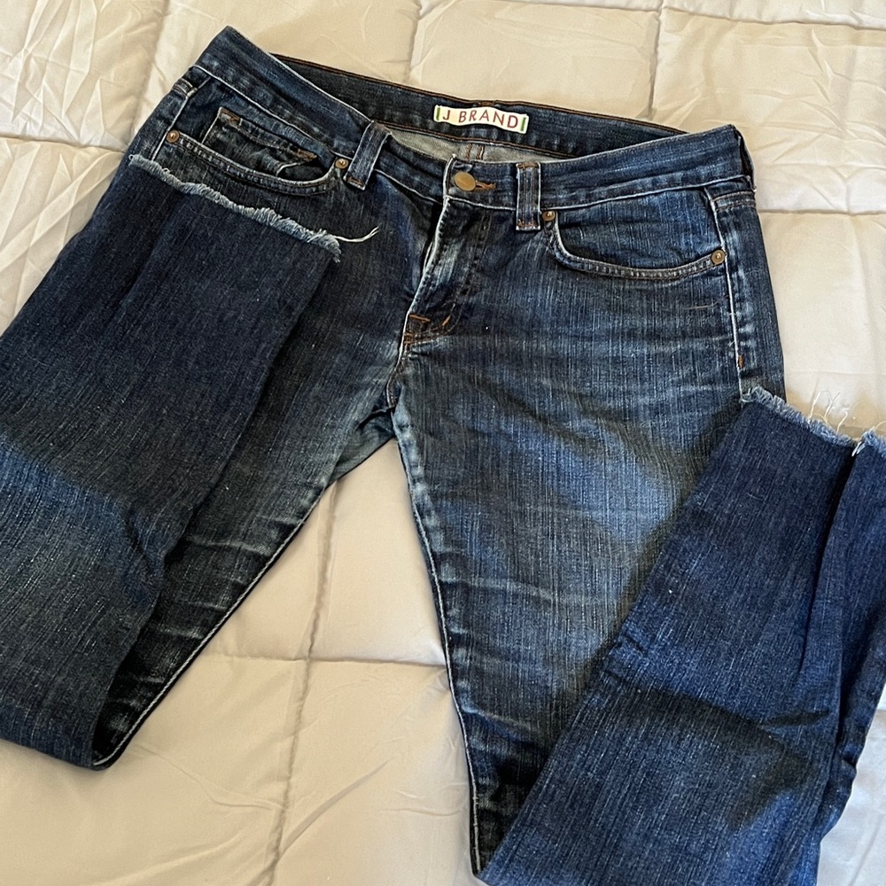 Perfectly worn in J Brand jeans. Frayed bottom!